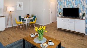 Suite Deluxe, 1 camera da letto | Soggiorno | TV