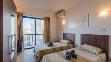 Apartemen Comfort, Beberapa Tempat Tidur, Bebas Asap Rokok, pemandangan kota | 2 kamar tidur, meja kerja, tirai kedap cahaya, dan setrika/meja setrika