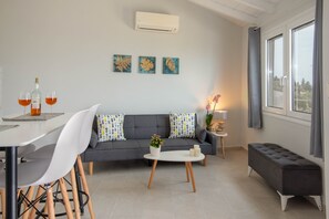 Apartment, 1 Queen Bed with Sofa bed, Terrace, Sea View | Living room | Flat-screen TV