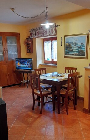 Apartment, 1 Queen Bed with Sofa bed | Living area | 30-cm LCD TV with digital channels, TV - B&B La Margine con area benessere (Bagni di Lucca)