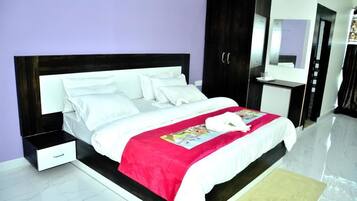 Deluxe Room | Iron/ironing board