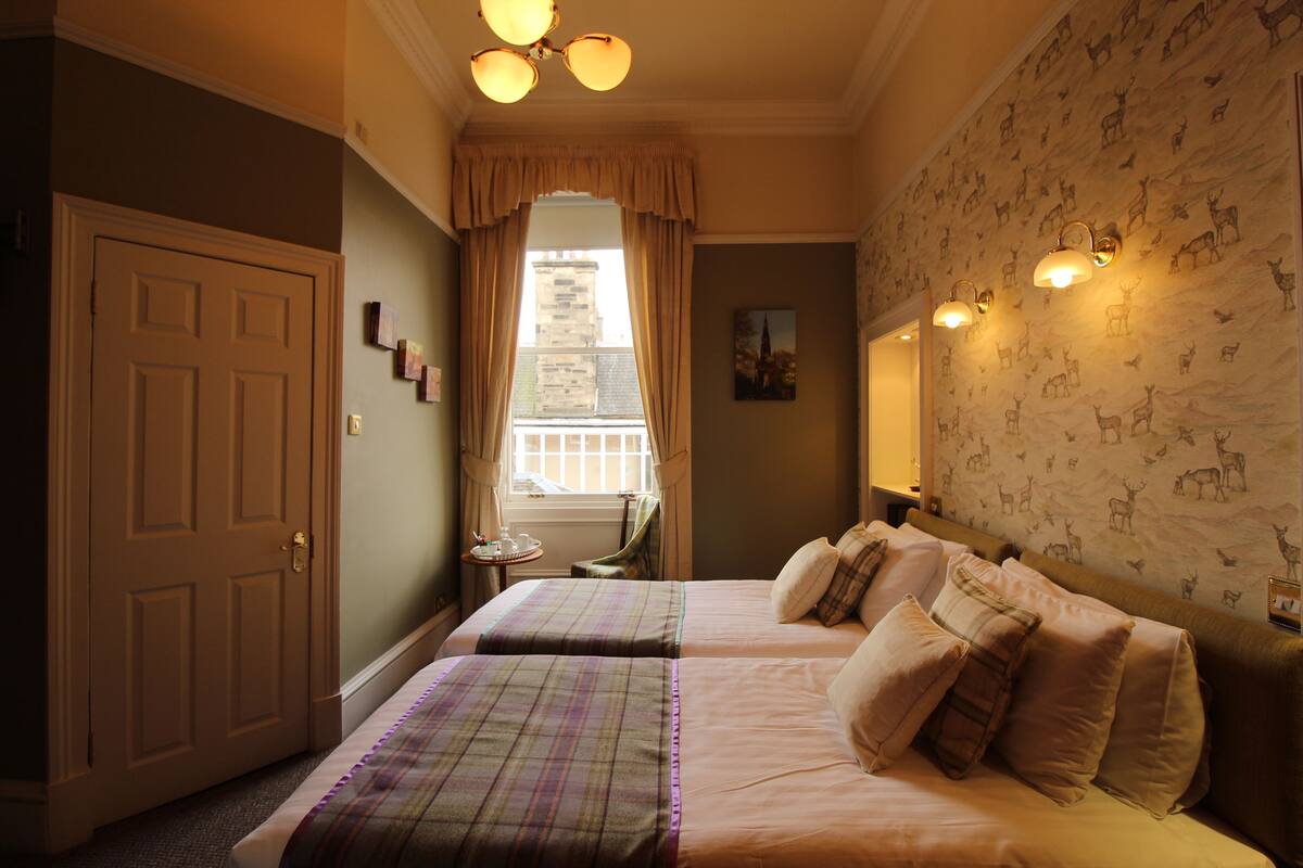 Desk, iron/ironing board, free WiFi, bed sheets