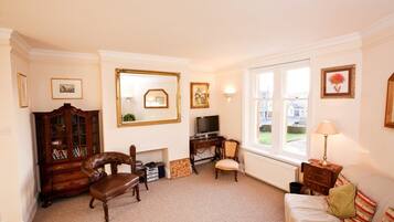 Apartment, 2 Bedrooms | Living area | Flat-screen TV, DVD player