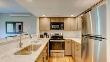 Condo, 2 Bedrooms | Private kitchen | Fridge, oven, coffee/tea maker, toaster