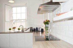 Apartment (1 Bedroom) | Private kitchen | Microwave, oven, stovetop, dishwasher