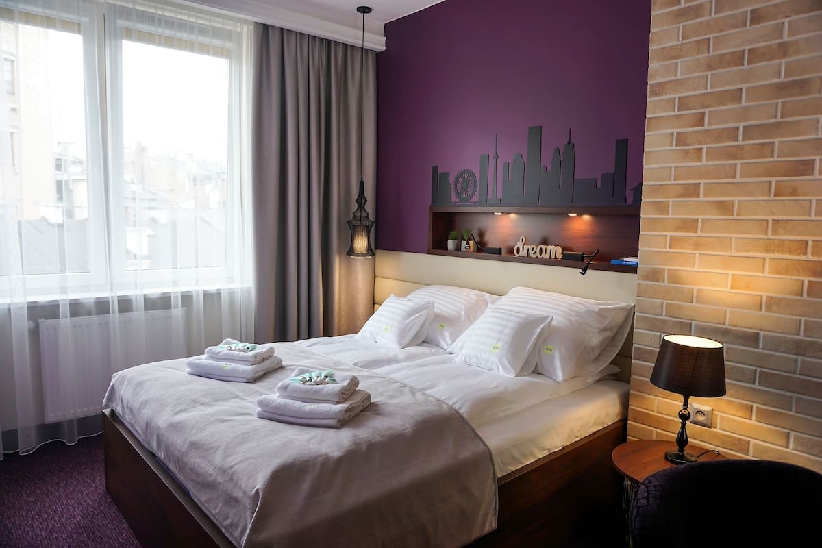 Deluxe appartement (Tianjin) | 1 slaapkamer, luxe beddengoed, een minibar, een kluis op de kamer