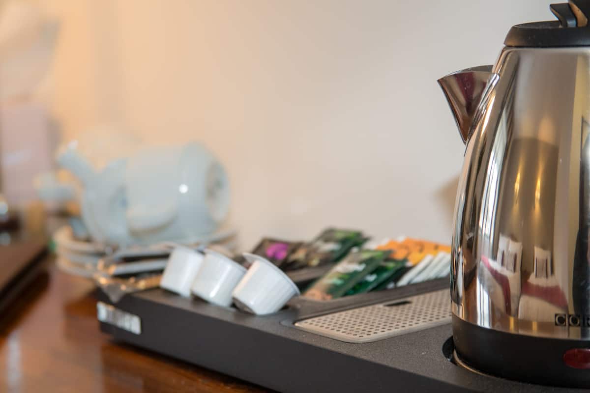 Habitación triple Deluxe | Café y/o cafetera