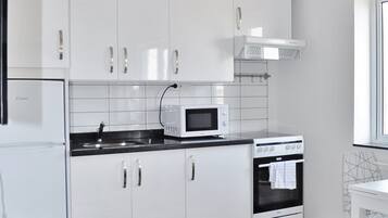 Eenvoudig appartement | Privékeuken | Een waterkoker
