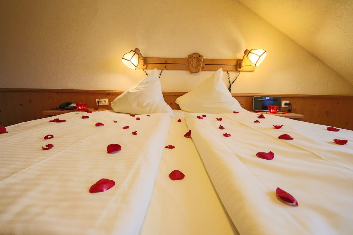 Suite (Landhaus) | Seprai premium, selimut bulu angsa, minibar, dan brankas