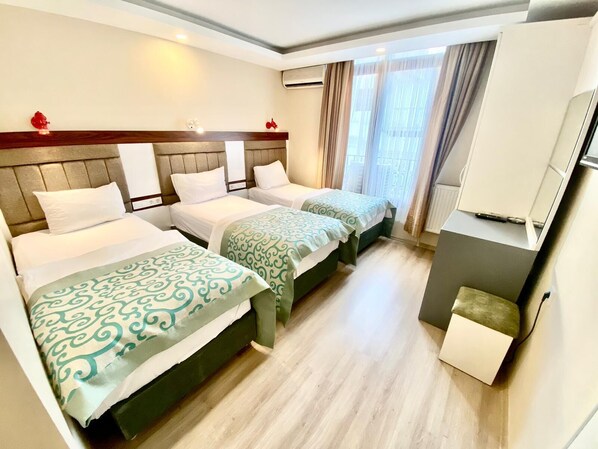 Standard Triple Room | In-room safe, desk, free WiFi, bed sheets - Grand Lara Hotel (Istanbul)
