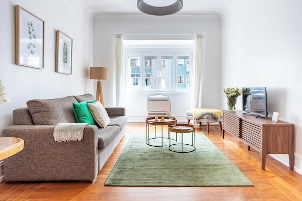 Family Apartment, 4 Bedrooms, Kitchen, City View | Living area | Flat-screen TV