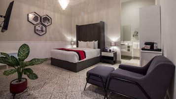 Quarto superior | Roupas de cama premium, edredons de pluma, frigobar, cofres nos quartos