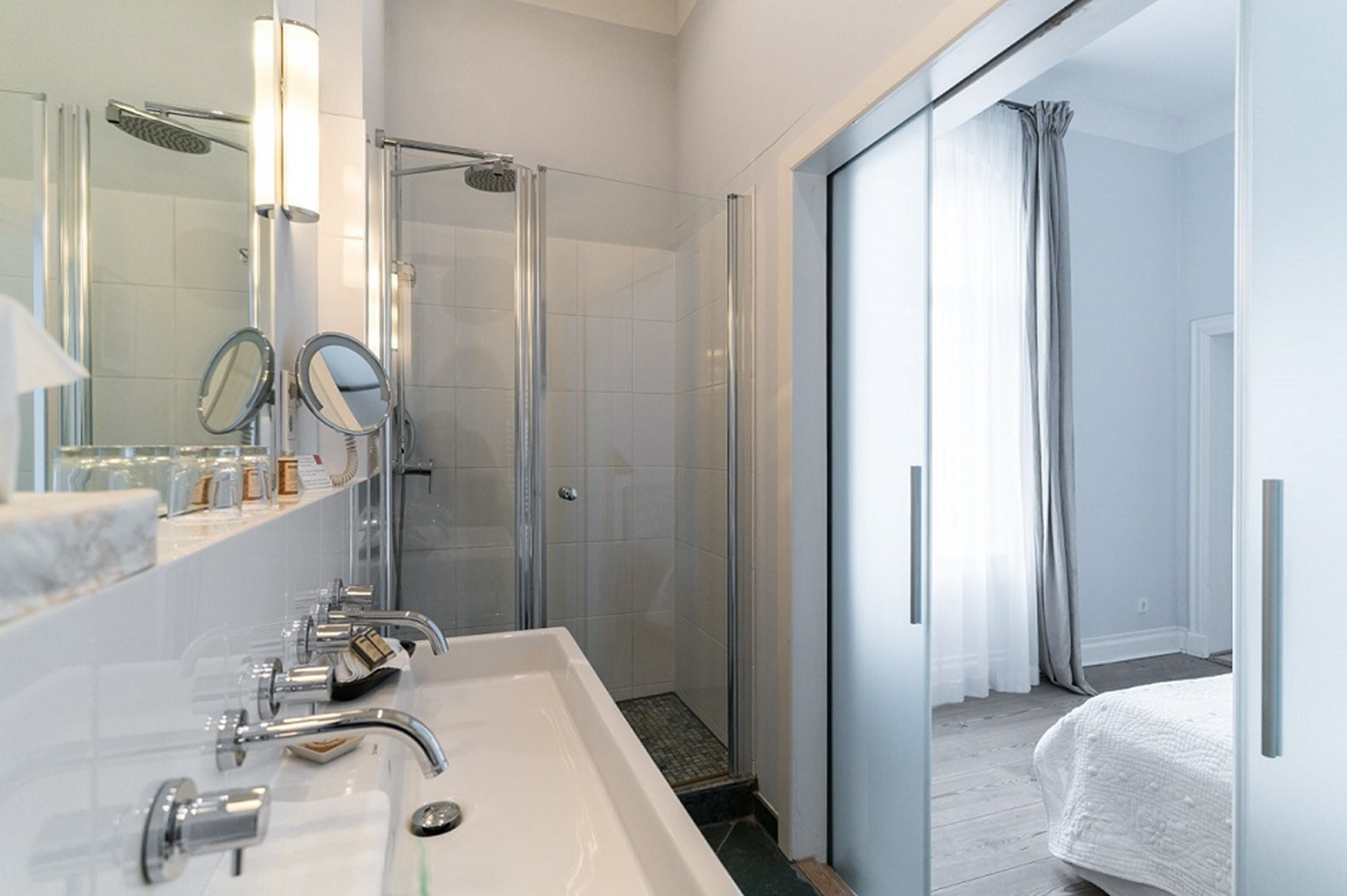 rainfall showerhead, hair dryer, heated floors, towels