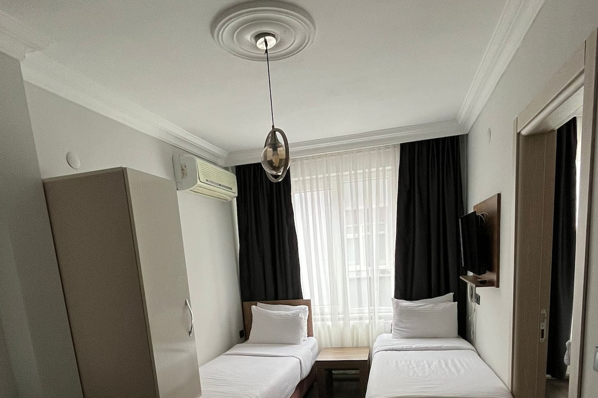 Basic Twin Room | Premium bedding, soundproofing, free WiFi, bed sheets
