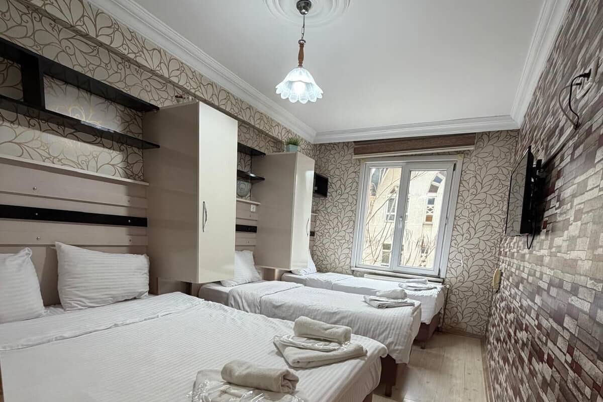 Basic Triple Room | Premium bedding, soundproofing, free WiFi, bed sheets