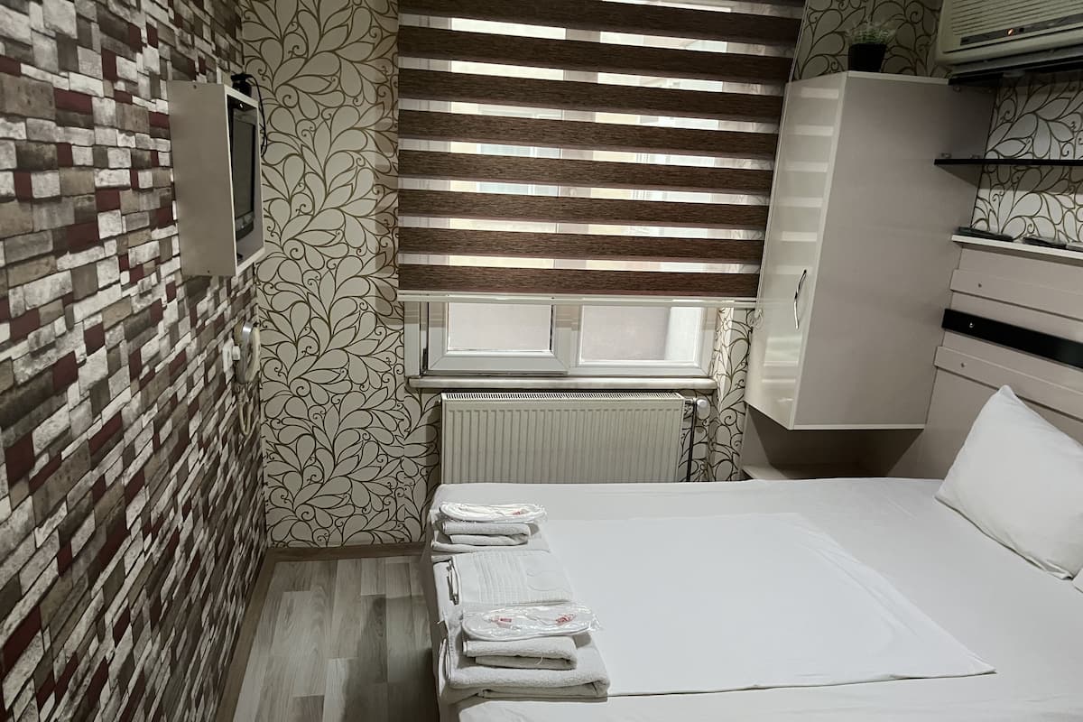 Luxe beddengoed, geluiddichte muren, gratis wifi, beddengoed