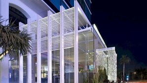 A modern building with a glass facade and white structural elements. - Andaz West Hollywood (West Hollywood)
