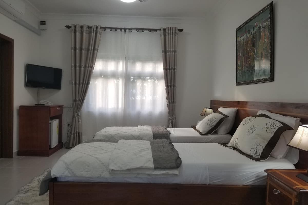 luxury double room, 2 single beds, garden view | 1 bedroom, premium bedding, desk, laptop workspace