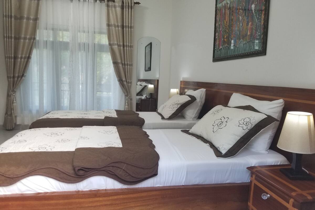 luxury double room, 2 single beds, garden view | 1 bedroom, premium bedding, desk, laptop workspace