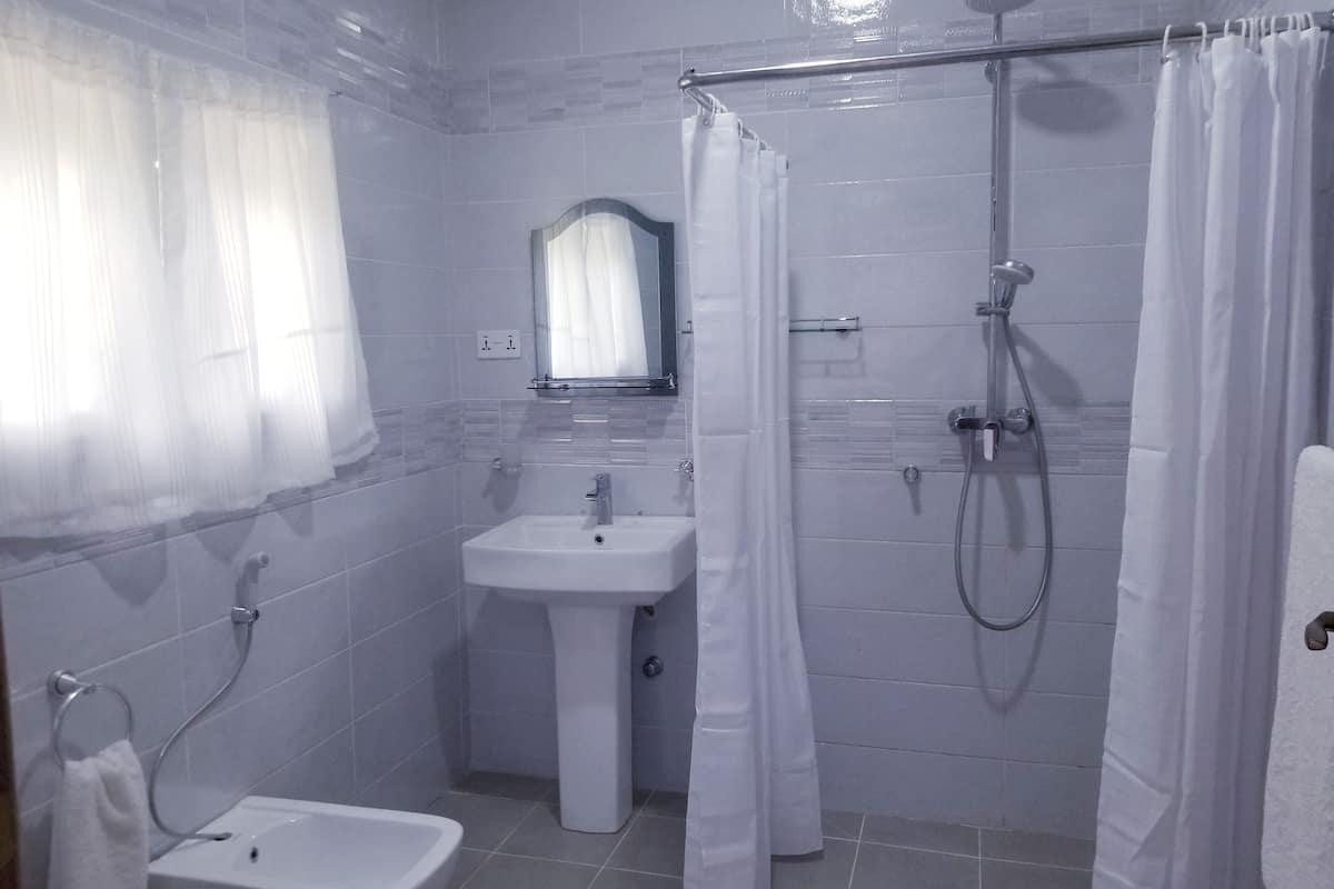 royal room, balcony, ocean view | bathroom | shower, rainfall showerhead, towels