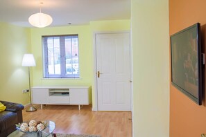 Huis | Woonkamer | Een flatscreentelevisie