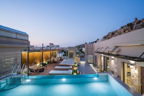 Outdoor pool, open 10:00 AM to 9:00 PM, pool umbrellas, sun loungers