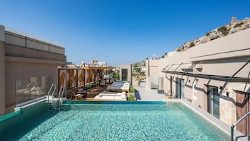 Outdoor pool, open 10:00 AM to 9:00 PM, pool umbrellas, sun loungers