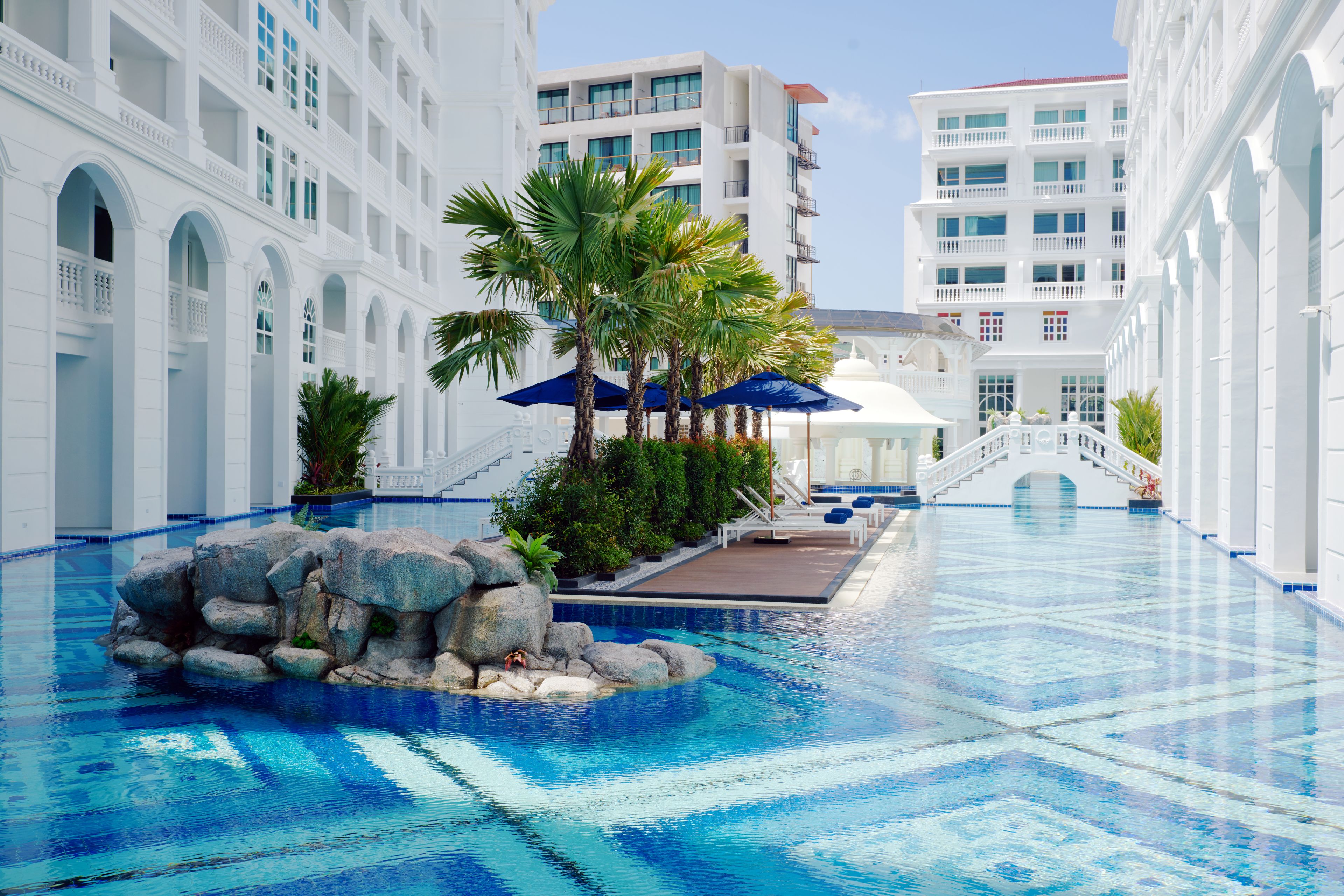 outdoor pool, open 7:00 am to 9:00 pm, pool umbrellas, pool loungers
