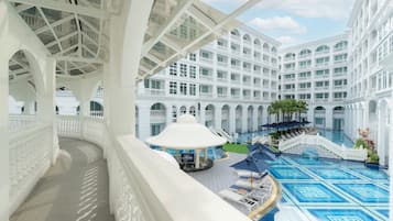 Outdoor pool, open 7:00 AM to 9:00 PM, pool umbrellas, pool loungers