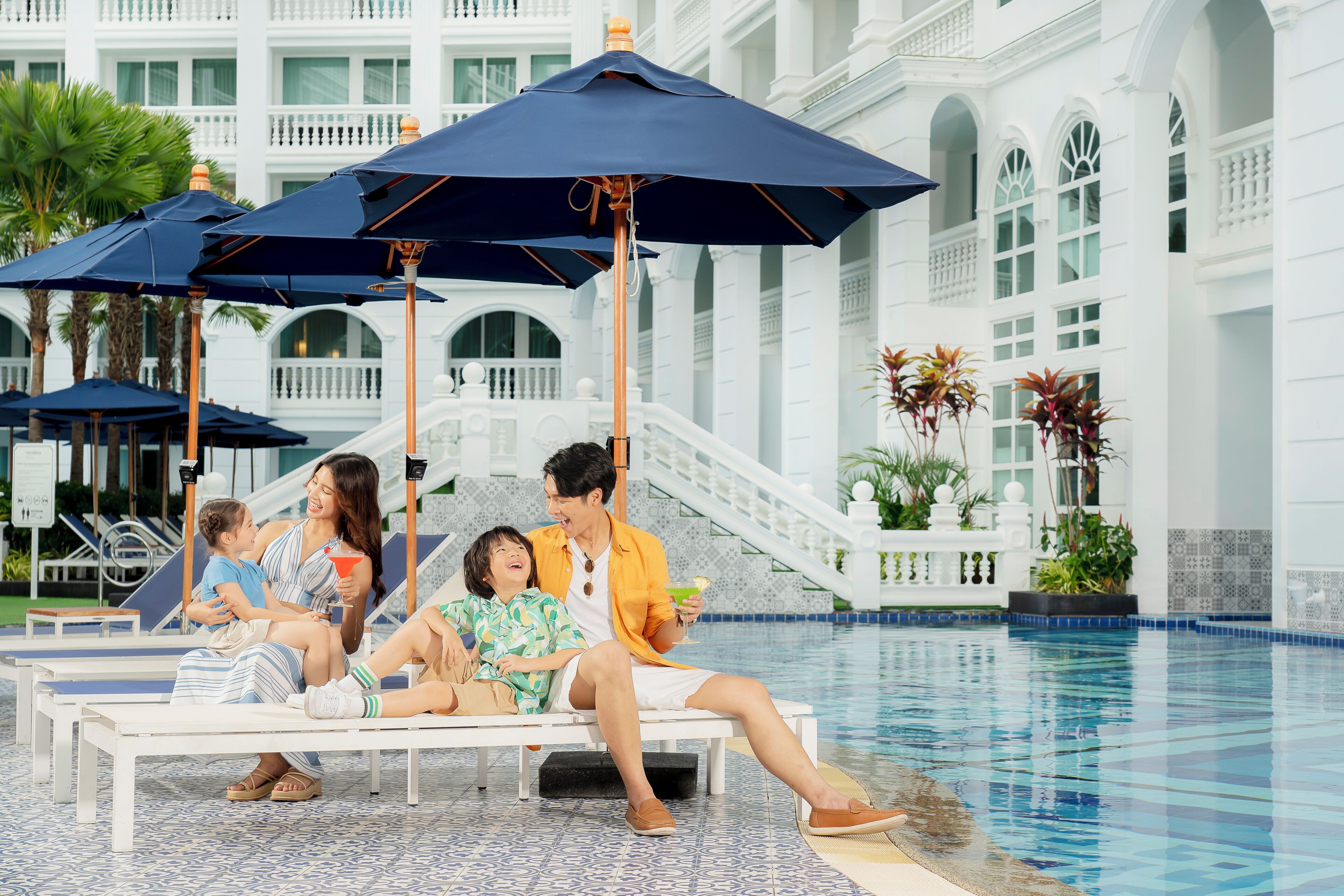 Outdoor pool, open 7:00 AM to 9:00 PM, pool umbrellas, pool loungers