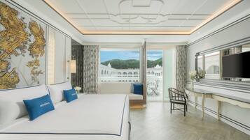 Classic Room, 1 King Bed, Pool View | Minibar, in-room safe, desk, laptop workspace