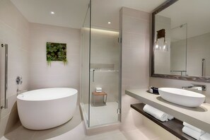 Designer toiletries, hair dryer, bathrobes, slippers