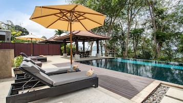 Outdoor pool, pool umbrellas, pool loungers