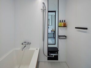 Separate tub and shower, deep soaking tub, free toiletries, hair dryer