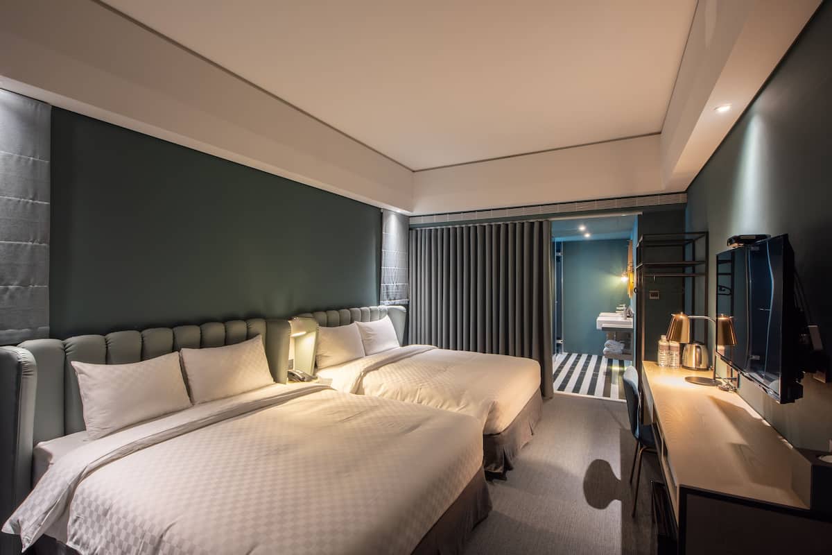 quadruple room, bathtub | down duvets, desk, laptop workspace, blackout curtains