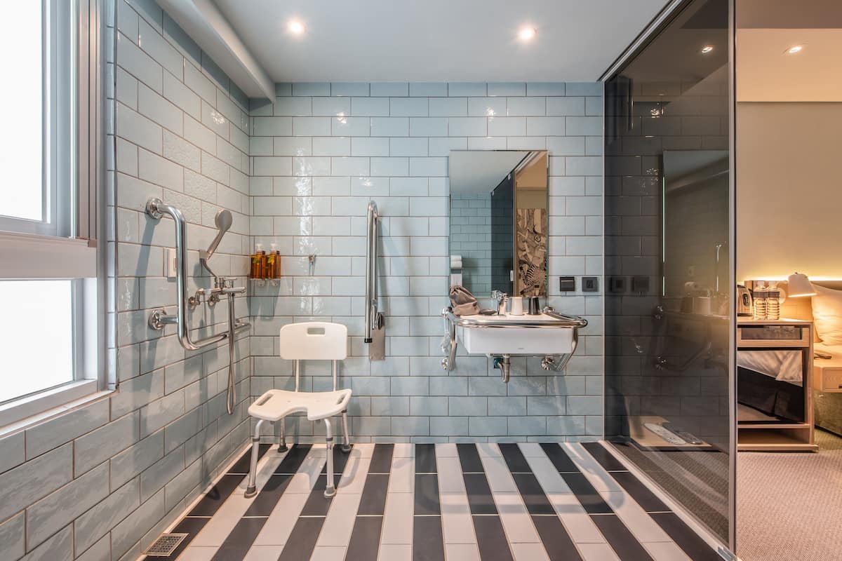 basic double room | bathroom | hydromassage showerhead, hair dryer, slippers, towels