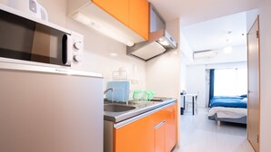 Apartment | Private kitchenette | Full-sized fridge, microwave, stovetop, electric kettle - City Central NAMBA PH208 (Osaka)