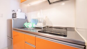 Apartment | Private kitchenette | Full-sized fridge, microwave, stovetop, electric kettle - City Central NAMBA PH208 (Osaka)