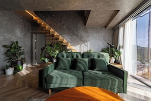 Familienzimmer, 2 Schlafzimmer, Annex (Deluxe) | Wohnbereich