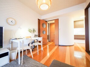 Apartment | Living room | Flat-screen TV - Family Stay DOTONBORI II PH14 (Osaka)