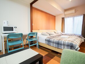 Apartment | Living area | Flat-screen TV - Family Stay DOTONBORI III PH26 (Osaka)