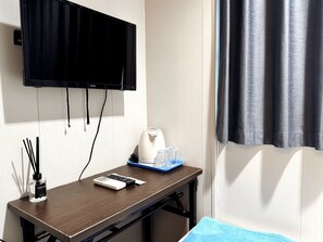 Habitación individual | Escritorio, insonorización, tabla de planchar con plancha y wifi gratis 