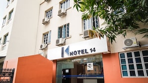 A hotel entrance with a sign reading "HOTEL 14" and a "Wi-Fi available" sign. - K Hotel 14 (Singapore)