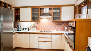 Villa | Private kitchenette | Fridge, oven, stovetop, dishwasher