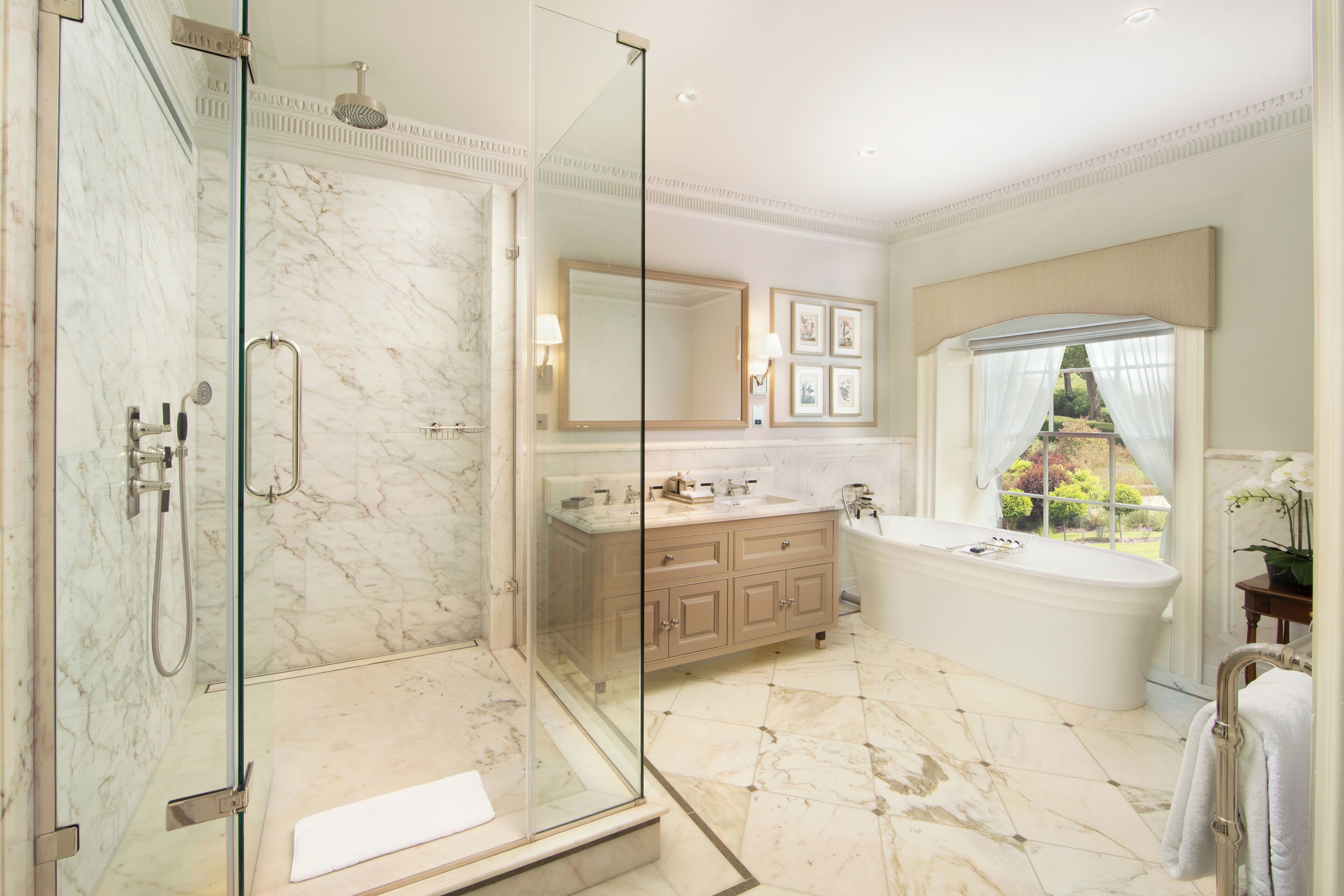grand suite | bathroom | shower, rainfall showerhead, free toiletries, hair dryer