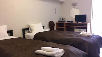 Blackout curtains, free WiFi, bed sheets