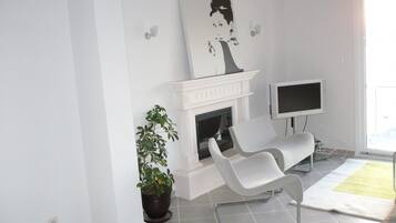 Villa | Coin séjour | Télévision LCD, cheminée