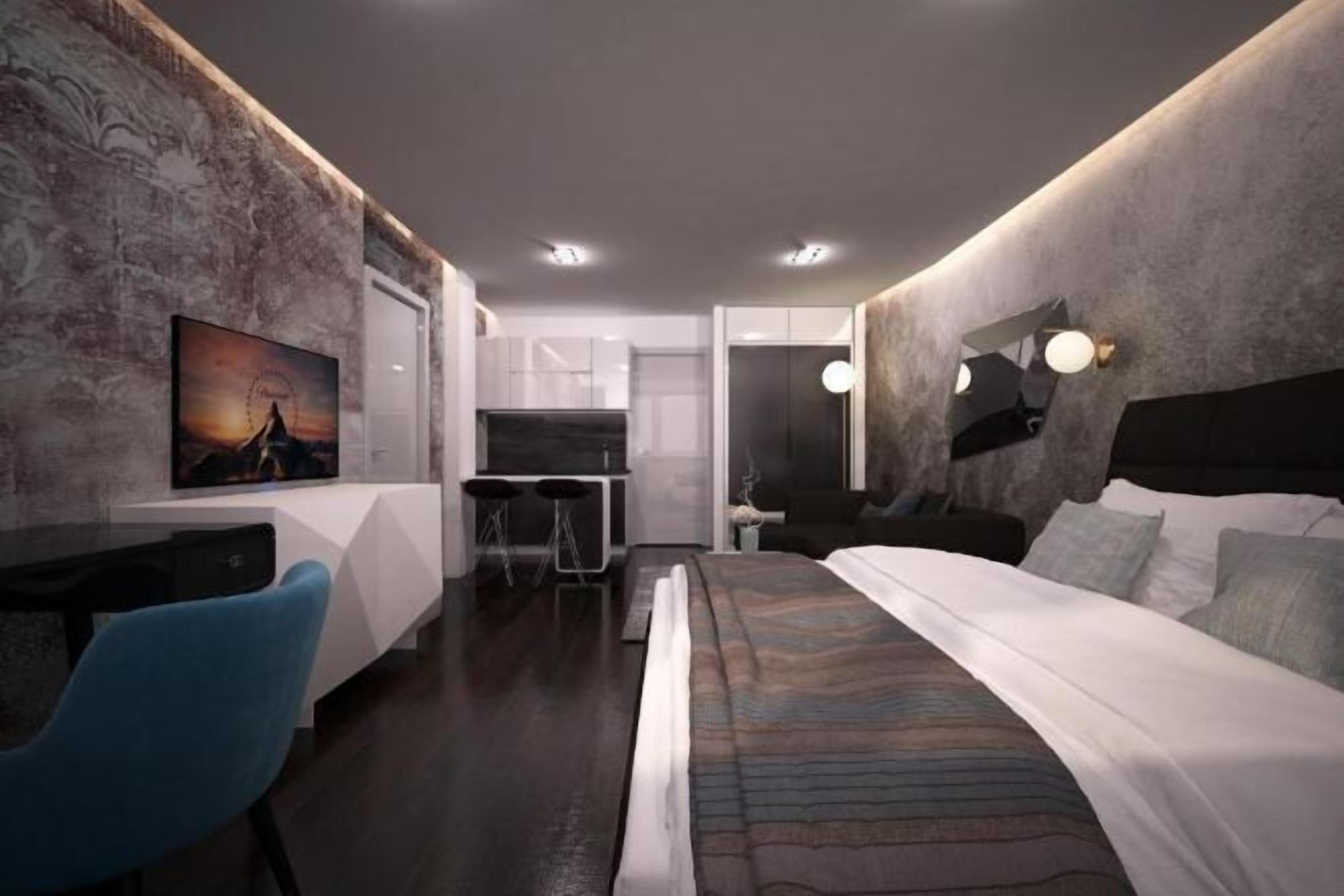 Minibar, värdeförvaringsskåp på rummet och skrivbord