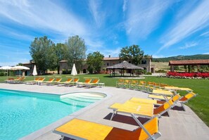 Seasonal outdoor pool, open 8:30 AM to 7:30 PM, pool umbrellas