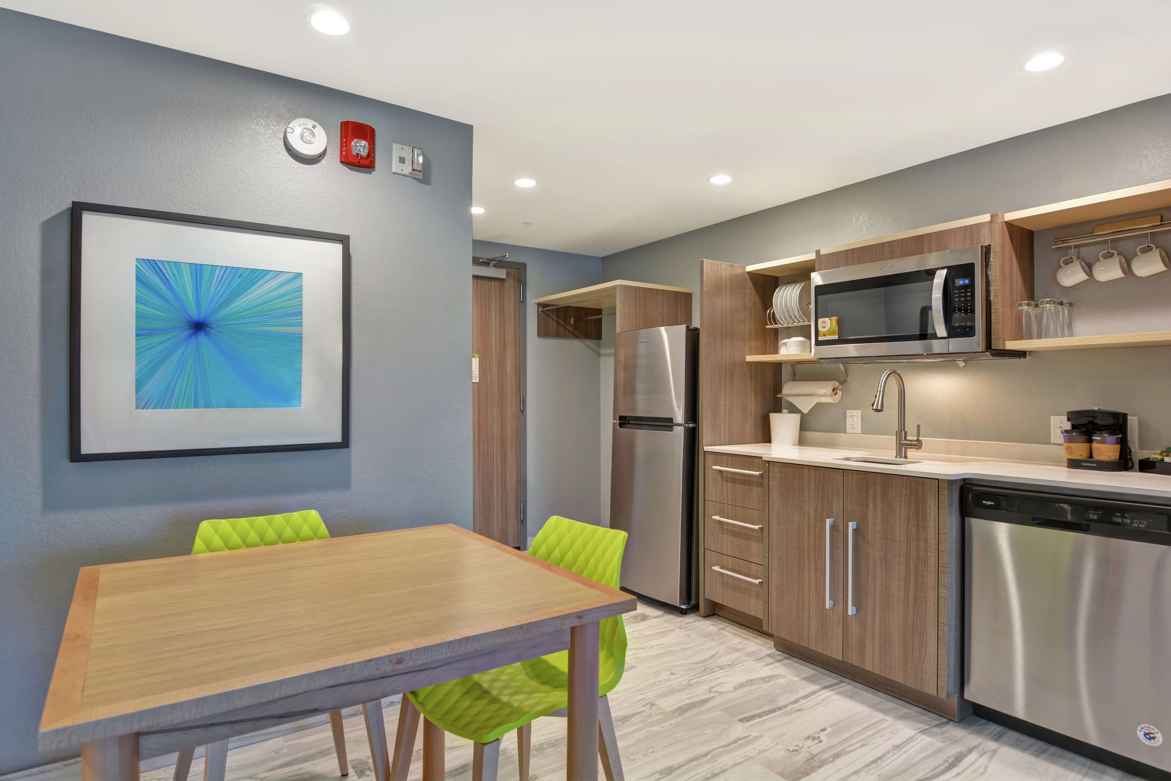 full-sized fridge, microwave, dishwasher, coffee/tea maker